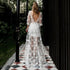 Elegant Backless A-Line Wedding Gown with Lace Appliques and Floor-Length Design