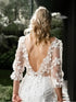 Elegant Backless A-Line Wedding Gown with Lace Appliques and Floor-Length Design