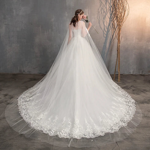 Enchanting Lace Princess Wedding Gown with Long Train and Embroidery