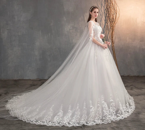 Enchanting Lace Princess Wedding Gown with Long Train and Embroidery