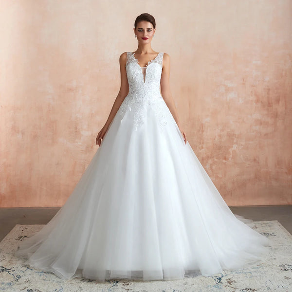 Ball Gown Illusion Wedding Dress With V Neck Sleeveless Tulle Overlay And Sequin Appliques