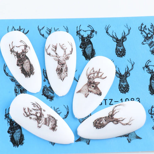 Winter Wonderland Nail Art Stickers with Snowflakes, Cute Santa, Snowman, and Winter Birds for Festive Manicure Decoration - 4pcs Set of Water Transfer Sliders and Temporary Tattoos