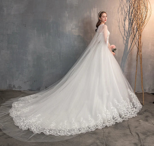 Enchanting Lace Princess Wedding Gown with Long Train and Embroidery