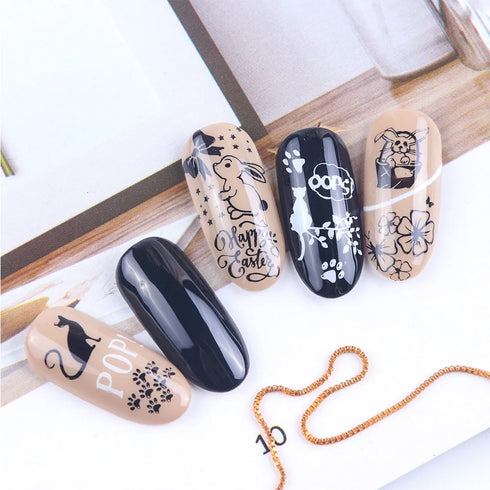 Retro Floral and Butterfly Nail Art Stamping Plate with Snowflake and Animal Designs - Creative Nail Templates for Stunning Manicures