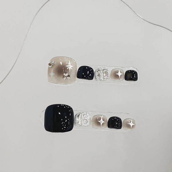 Glamorous 10-Piece Handmade Press-On Toenail Set with Glossy Black Stars and Glittering Diamond Accents for Stunning Nail Art at Parties