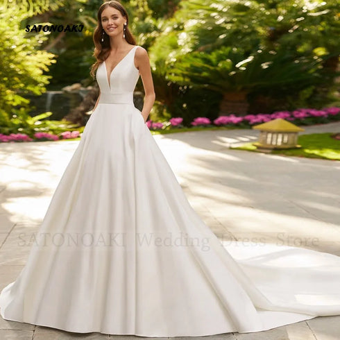 Customized Elegant Simple V-Neck Satin Wedding Dress A-Line Bridal Gown with Pockets and Bow