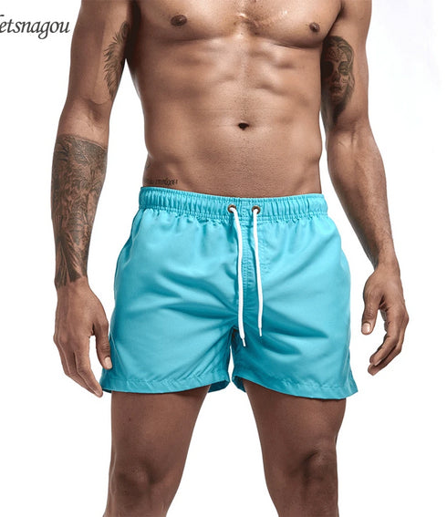 Men's Quick-Dry Swim Shorts with Pockets for Surfing and Beach Activities