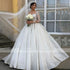 Customized Glitter Long Sleeves Ball Gown Wedding Dress for Women Bride with Chapel Train