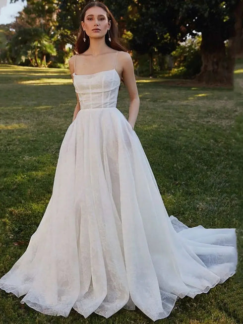 Customized Spaghetti Straps Wedding Dresses with Pockets and Backless Design