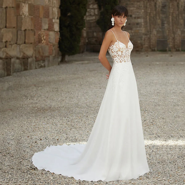 Backless Lace Appliques A Line Wedding Dress With Spaghetti Straps Romantic Silhouette Bridal Gown