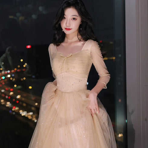 A-Line Illusion Bridesmaid Dress With Elegant Details And Subtle Sequins, Half Sleeves, Tulle, And Ankle Length