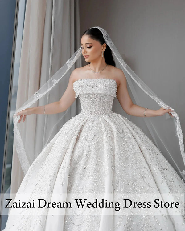 Beaded Pearl Ball Gown Wedding Dress With Sequined Appliques And Lace Strapless Backless