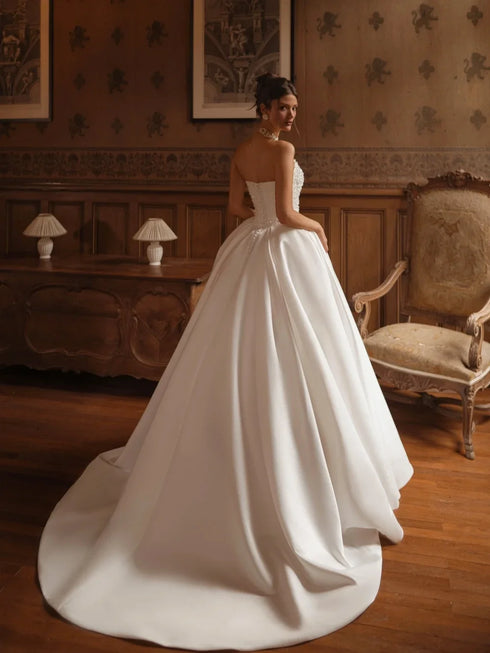 Strapless Beaded Pearls Wedding Dress Ball Gown With Button Back And Court Train Silhouette