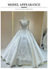 Luxurious Bridal Gown with Sparkling Embellishments Lace Embroidery and Long Train Wedding Dress