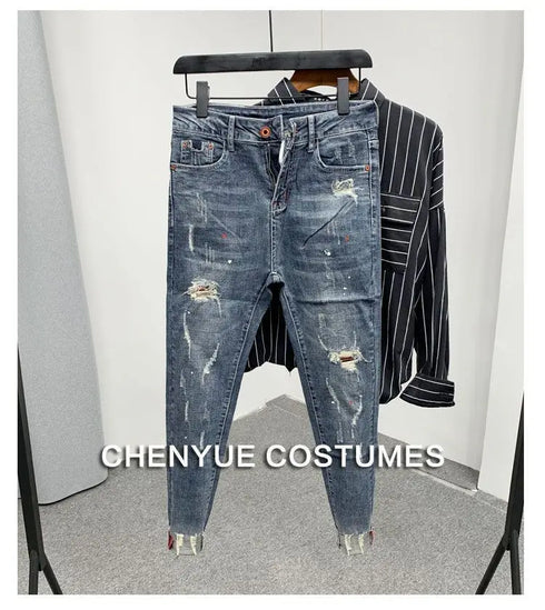 Korean Style Slim Men's Jeans with Cat Whisker Holes and Colorful Paint Splatters - Stylish Medium Wash Jeans for Casual Outfits
