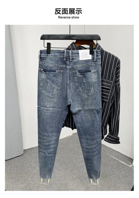 Korean Style Slim Men's Jeans with Cat Whisker Holes and Colorful Paint Splatters - Stylish Medium Wash Jeans for Casual Outfits