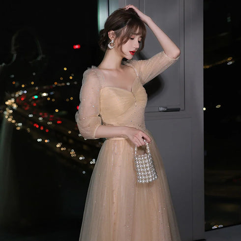 A-Line Illusion Bridesmaid Dress With Elegant Details And Subtle Sequins, Half Sleeves, Tulle, And Ankle Length