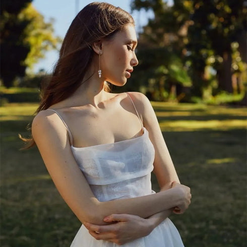 Customized Spaghetti Straps Wedding Dresses with Pockets and Backless Design