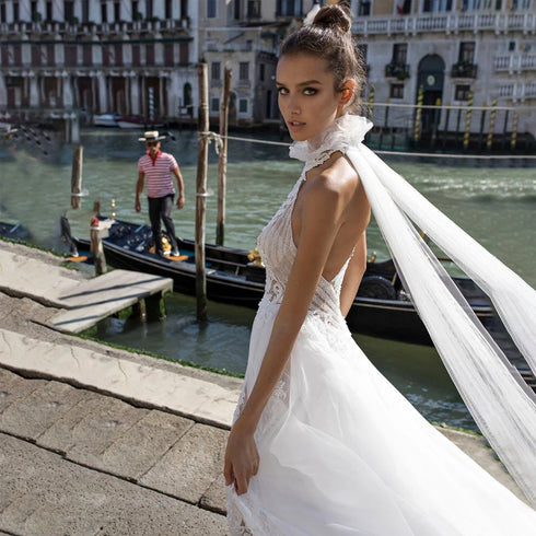Charming Lace Halter Bridal Gown with Elegant Appliques and Backless Design
