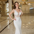 Elegant Mermaid Wedding Dress with Lace and Pearls Backless Design