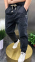 Luxury Baggy Denim Jeans for Men - Washed Streetwear Harem Trousers with Six Pockets, Elastic Waist, Perfect for Spring and Autumn, Casual Medium Wash Jeans Outfit