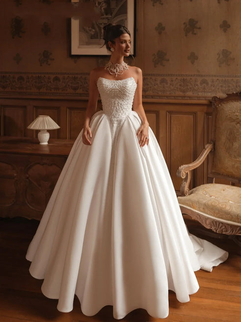 Strapless Beaded Pearls Wedding Dress Ball Gown With Button Back And Court Train Silhouette