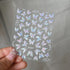 Adorable Pink Christmas Nail Art Stickers with Shiny Shells, Cute Snowflakes, Stars, and Wreaths - 5D Embossed Nail Decorations for Festive Nail Designs